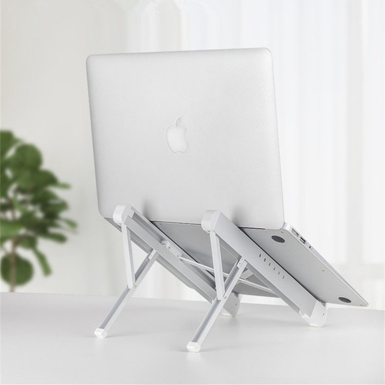 Dlaczego warto wybrać ergonomiczną, aluminiową podstawkę do notebooka z regulacją pionową, zapewniającą maksymalny komfort i produktywność